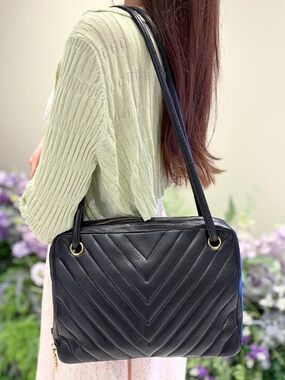 CHANEL CHEVRON Black Quilted CROSSBODY with Gold CC Charm